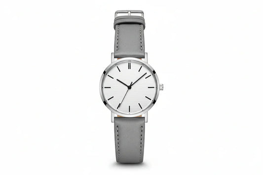 Minimalist silver wristwatch with white dial and grey leather strap on white background