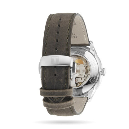 Mechanisch polshorloge met bruine leren band en zichtbare achterkant van het automatische uurwerk