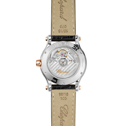 Luxury watch back with visible automatic movement, leather strap, and engraved details