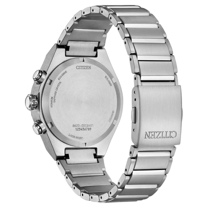 Back view of a stainless steel chronograph watch with engraved case and metal bracelet