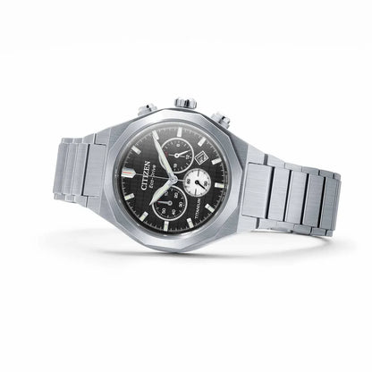 Stainless steel chronograph watch with black dial and silver bracelet on white background