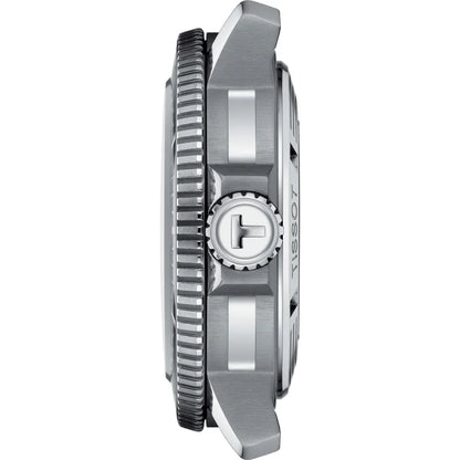Side view of a stainless steel watch case with textured crown and bezel