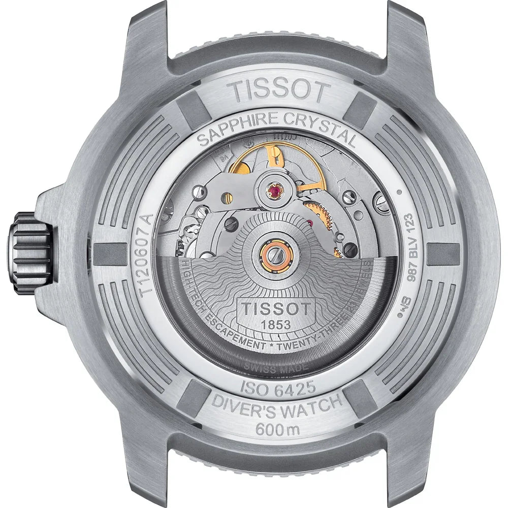 Close-up of Tissot diver's watch caseback showing sapphire crystal and automatic movement