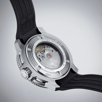 Automatic diver's watch back view with visible movement, black strap, and sapphire crystal