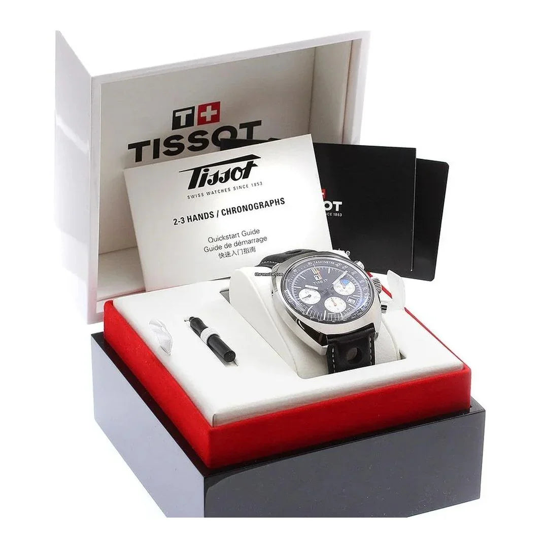 Chronograph wristwatch with black strap in presentation box, includes manual and tools