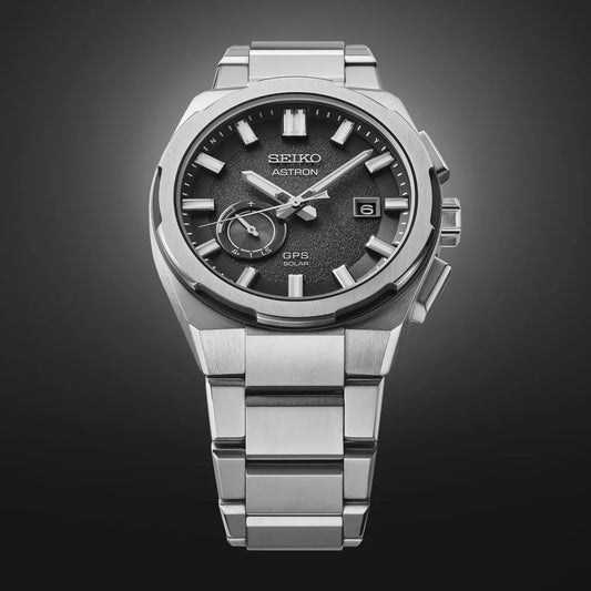 Titanium solar GPS men's watch with grey textured dial and stainless steel bracelet